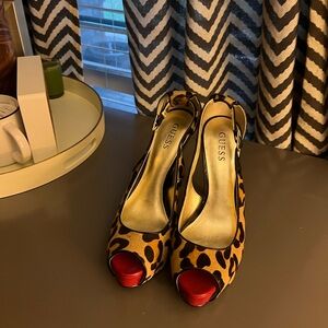 Stylish animal print heels with red accent !
